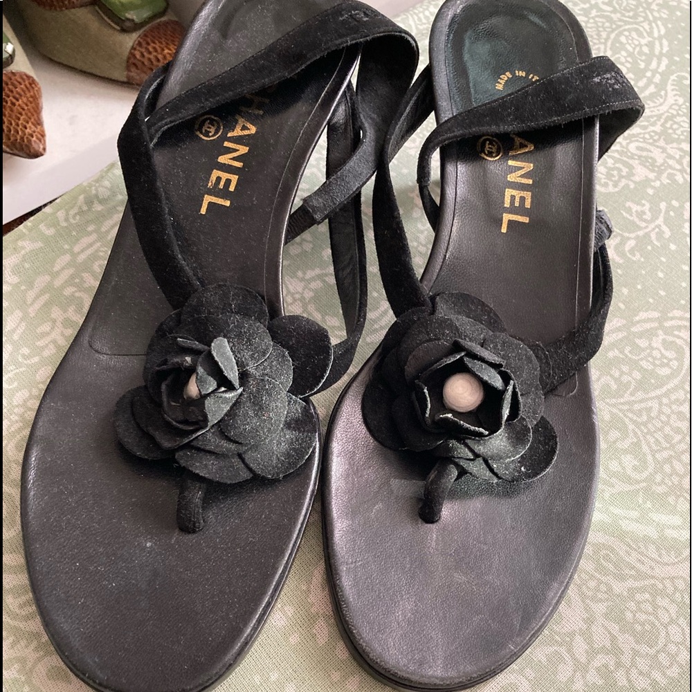 Authentic Chanel sandals never worn. Sexy, cute go from sun dress to roll jeans.